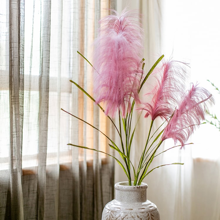 Faux Silk Artificial Pink Reed Grass Stem, 45 inches tall, featuring vibrant pink flowers and green stems, perfect for home decor.