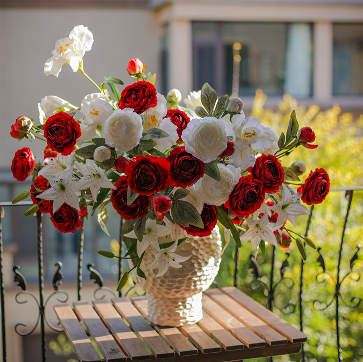 A 27.5-inch tall faux silk peony stem featuring two vibrant blooms and one bud, available in champagne, pink, red, and white colors.