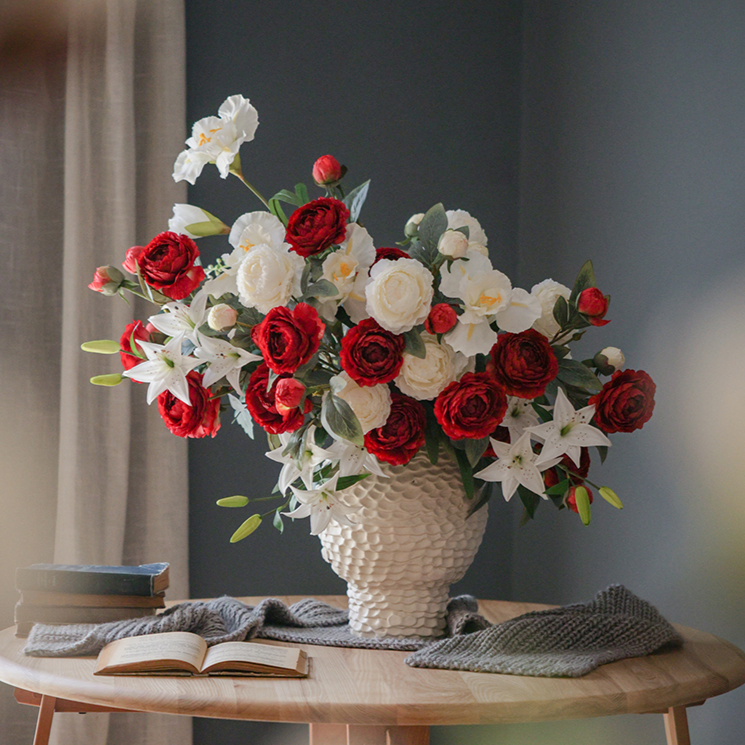 A 27.5-inch tall faux silk peony stem featuring two vibrant blooms and one bud, available in champagne, pink, red, and white colors.