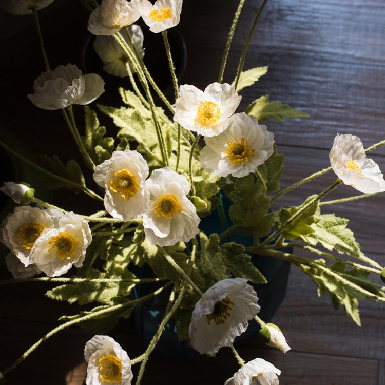 A 22-inch tall Faux Silk Common Poppy Flower Stem in pink and white, featuring four blooms and one bud, with green leaves.