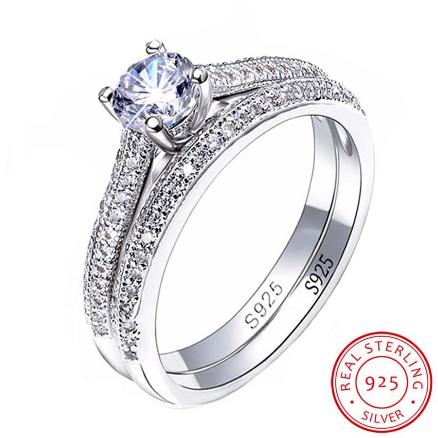 A stunning set of 100% original 925 silver rings for women, featuring sparkling cubic zircon stones in various elegant styles.