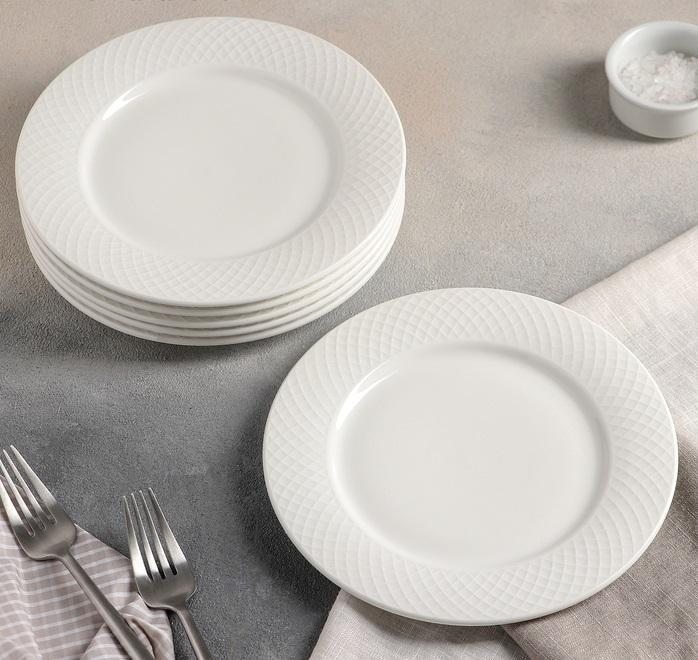 Fine Julia Porcelain 24 Piece Dinnerware Set for 6 featuring elegant herringbone design, including plates and stainless steel flatware.