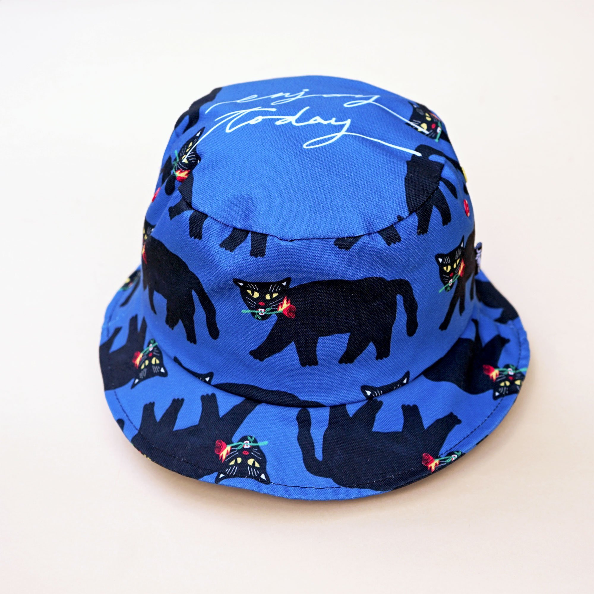 Fire Black Panther Bucket Hat featuring a black panther and red rose design on a cotton canvas material.