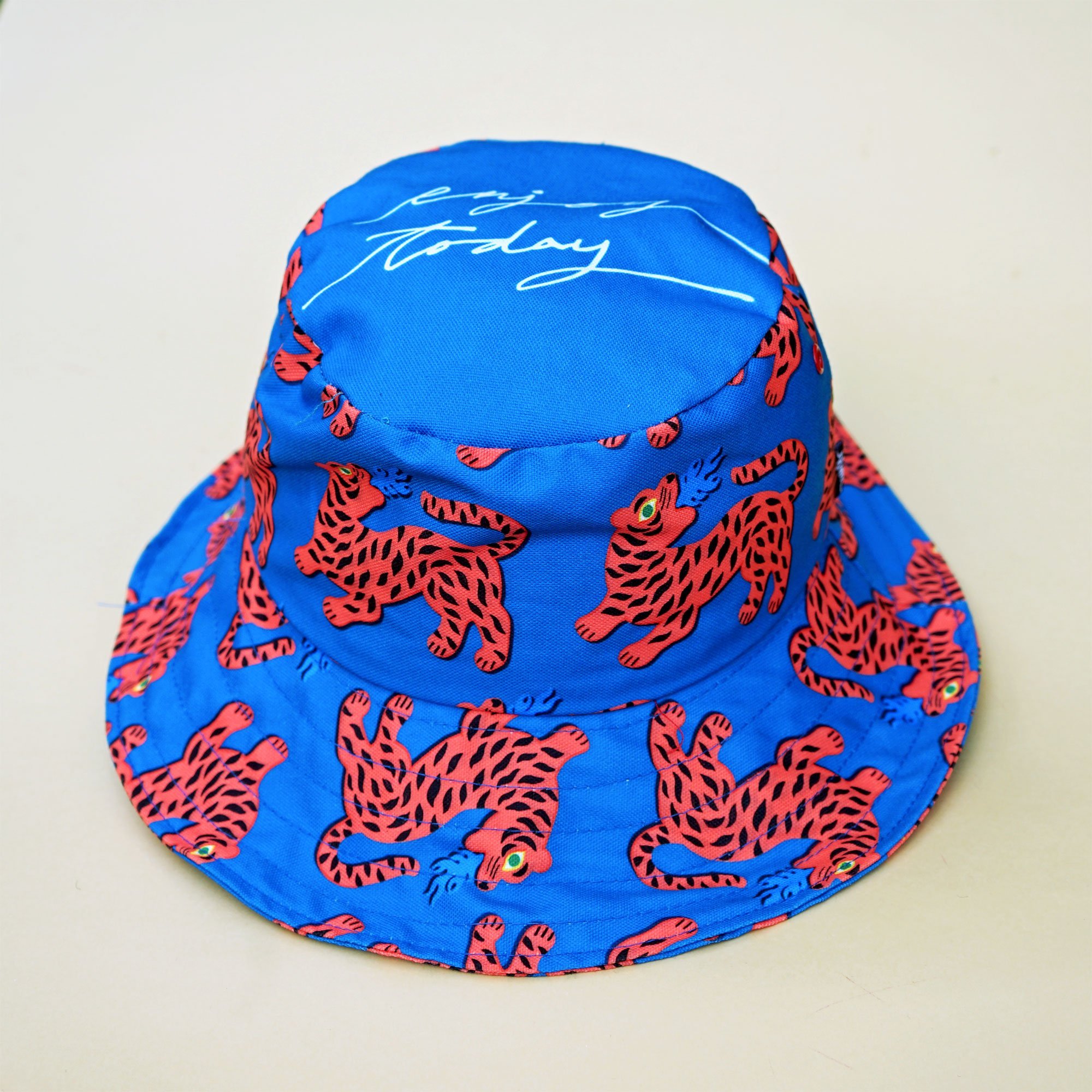 Fire Red Tiger Blue Wide Bucket Hat showcasing vibrant tiger print on a cotton canvas material, perfect for summer outings.