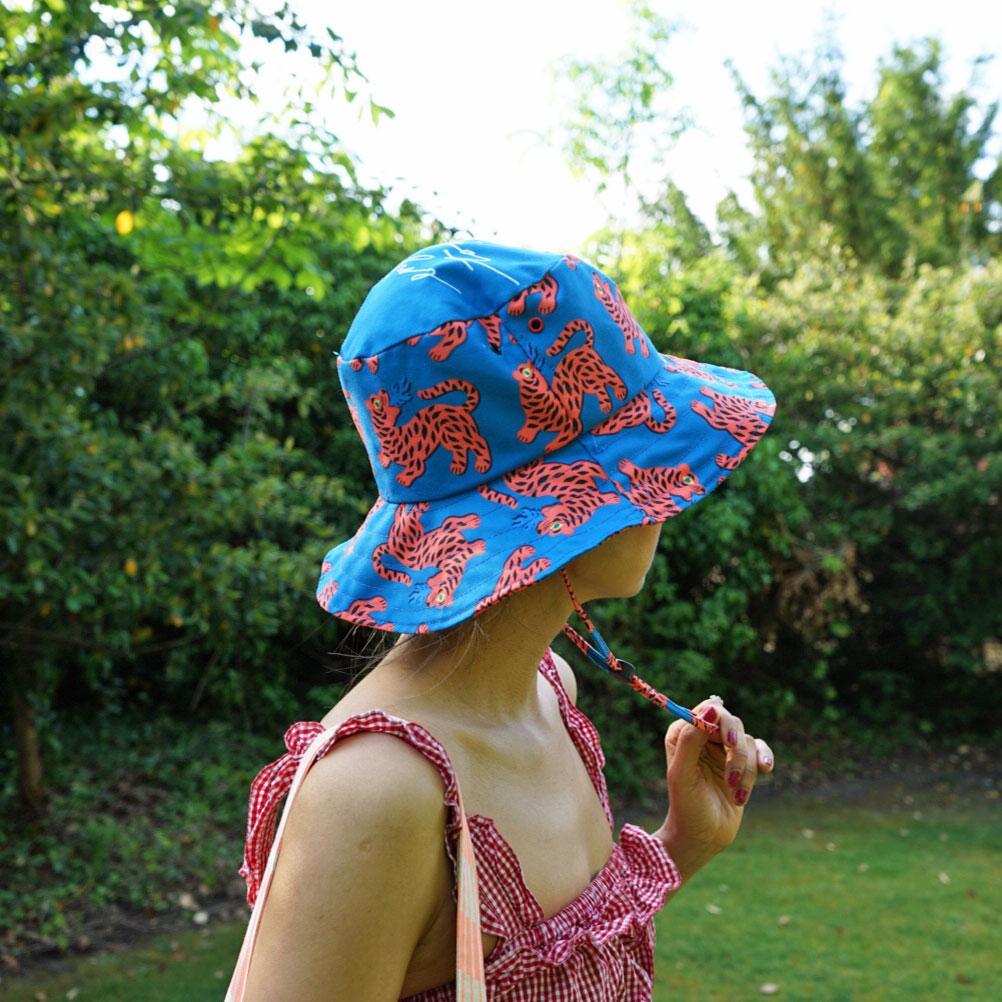 Fire Red Tiger Blue Wide Bucket Hat showcasing vibrant tiger print on a cotton canvas material, perfect for summer outings.