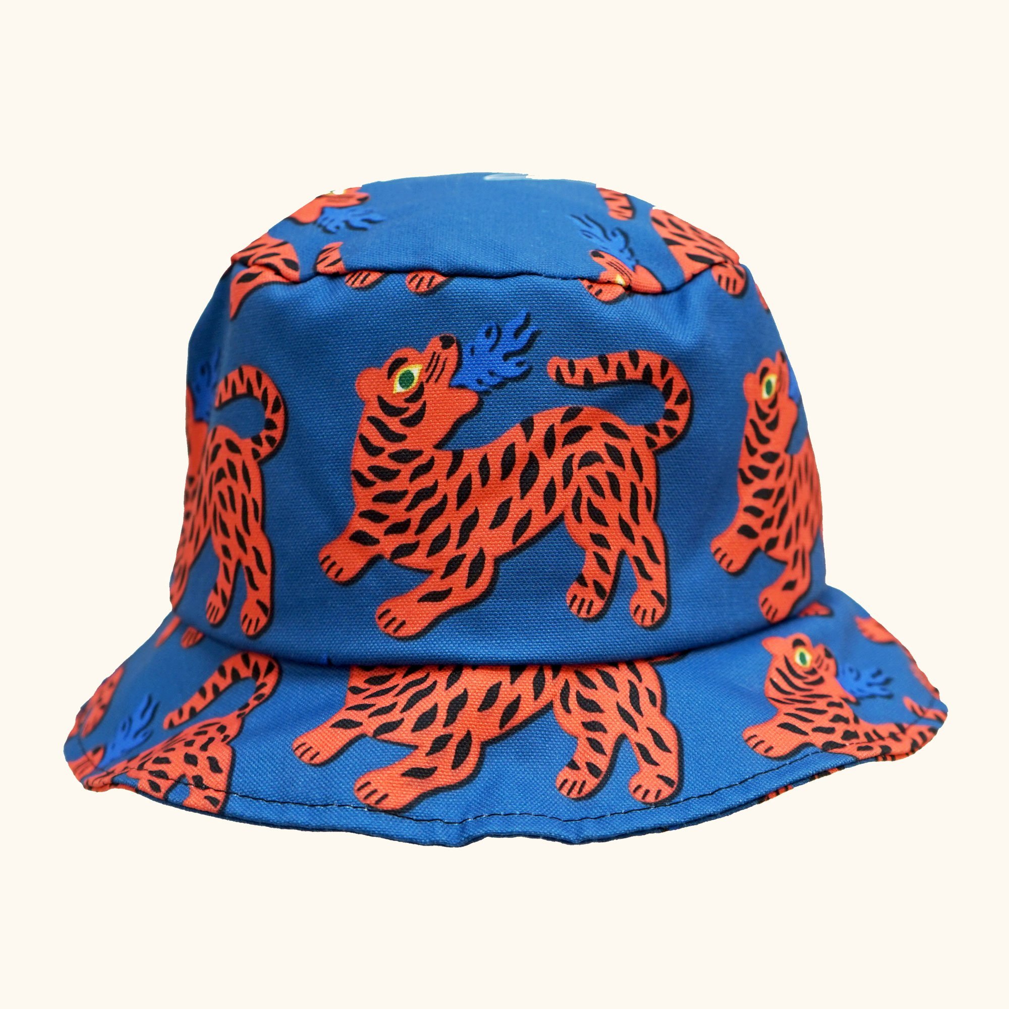 Fire Red Tiger Bucket Hat made of cotton canvas featuring a vibrant tiger print, perfect for summer outings.