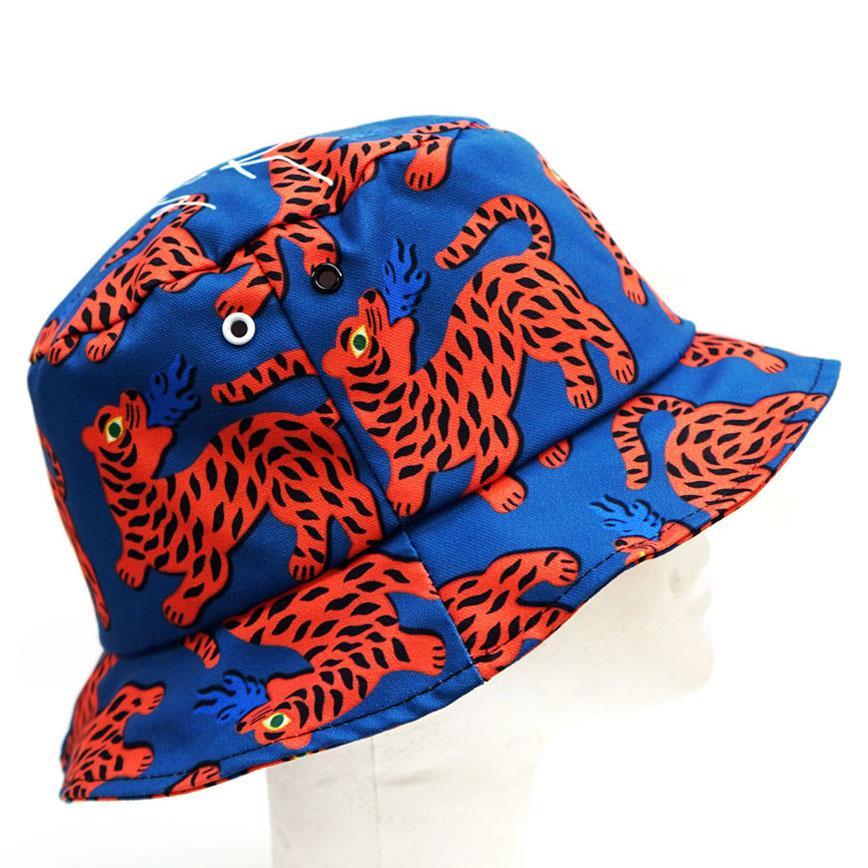 Fire Red Tiger Bucket Hat made of cotton canvas featuring a vibrant tiger print, perfect for summer outings.