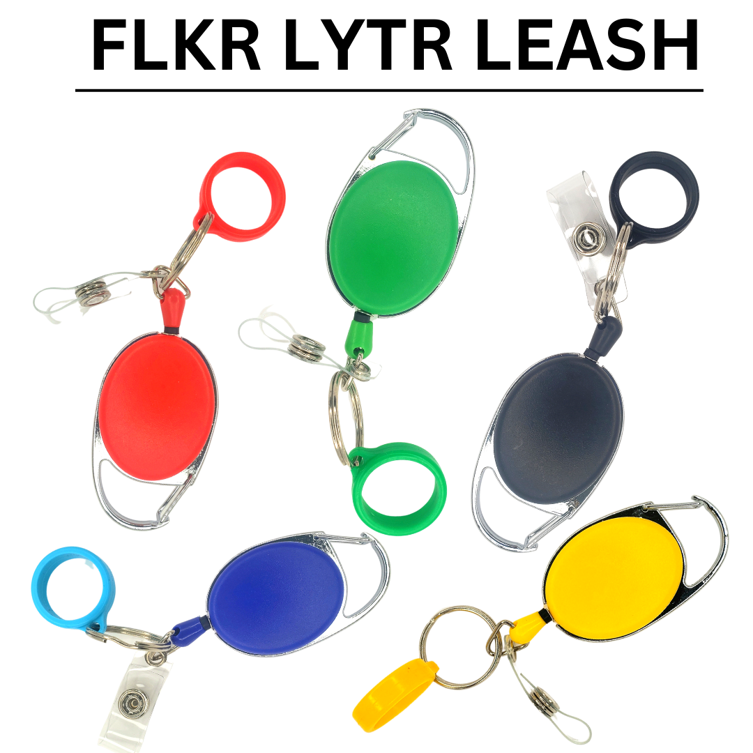 FLKR LYTR Heavy Duty Retractable Leash in multiple colors including red, blue, green, black, and yellow, showcasing its compact design and keychain clip.