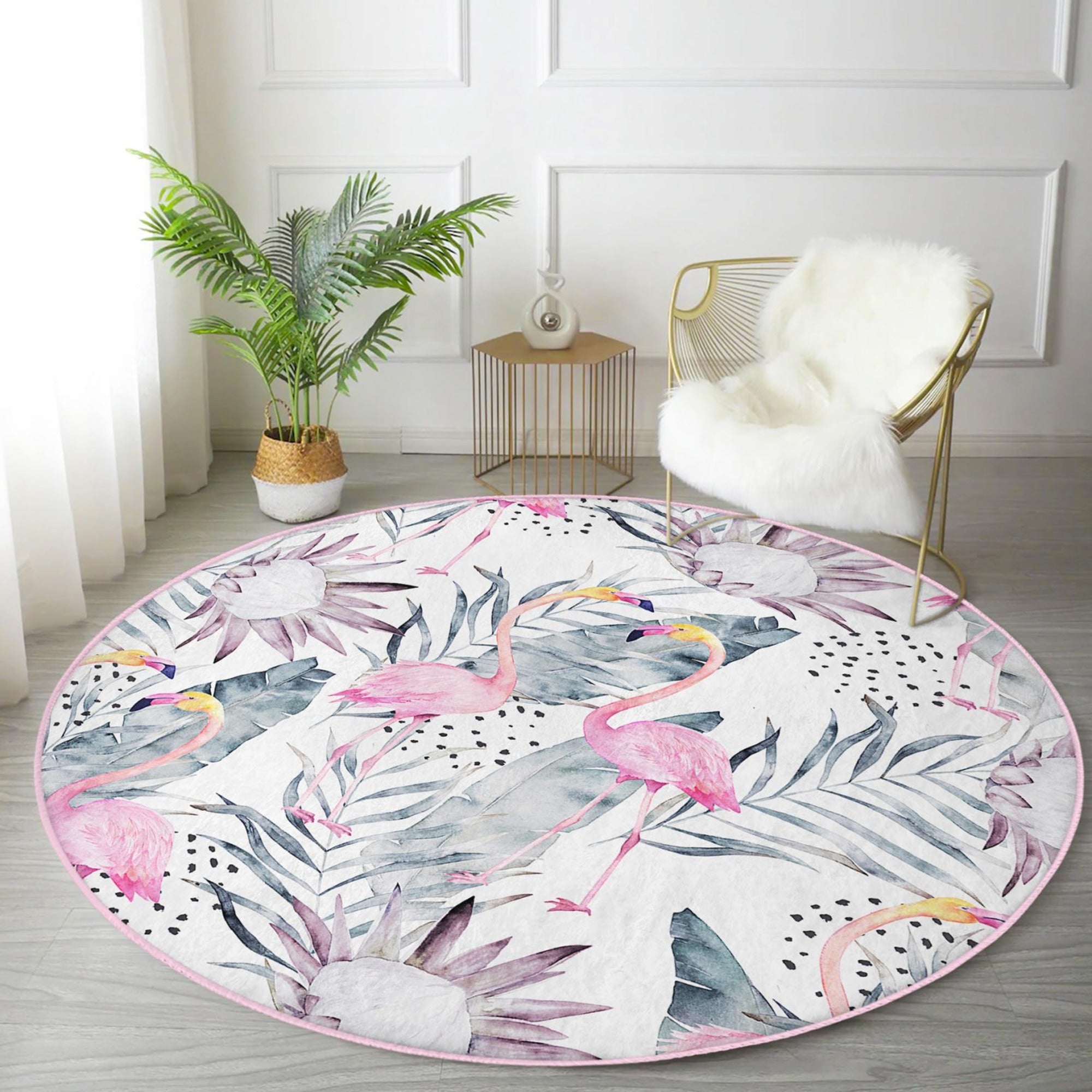 A vibrant round rug featuring a floral and flamingo pattern, perfect for living room decor.