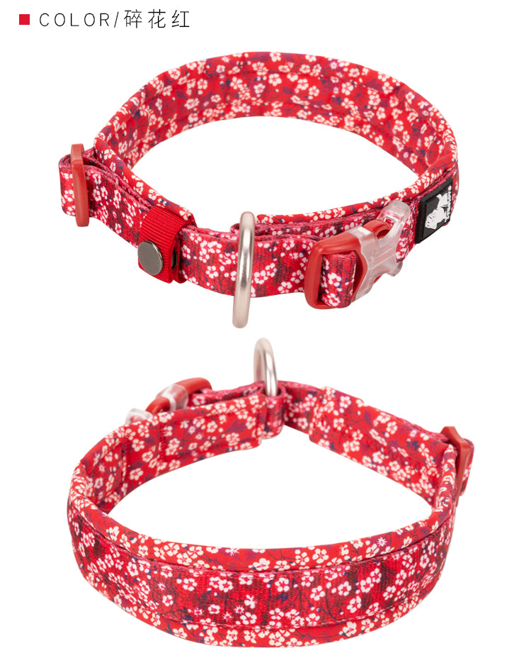 Floral dog collar in vibrant poppy red with padded design and durable snap buckle.