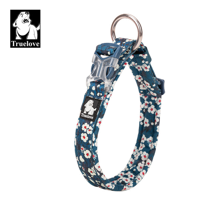 Floral Collar Saxony Blue L featuring a vibrant floral pattern, padded design, and durable snap buckle for comfort and style.