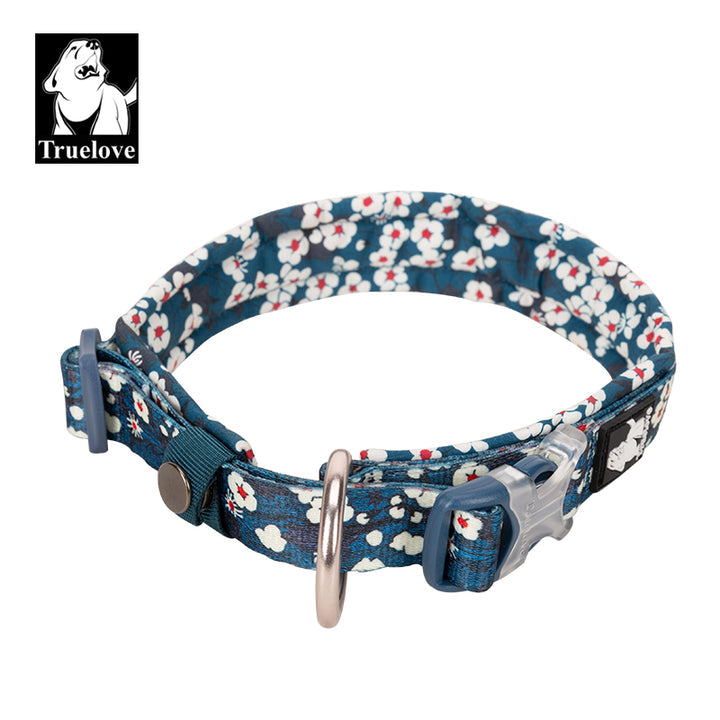 Floral Collar Saxony Blue L featuring a vibrant floral pattern, padded design, and durable snap buckle for comfort and style.