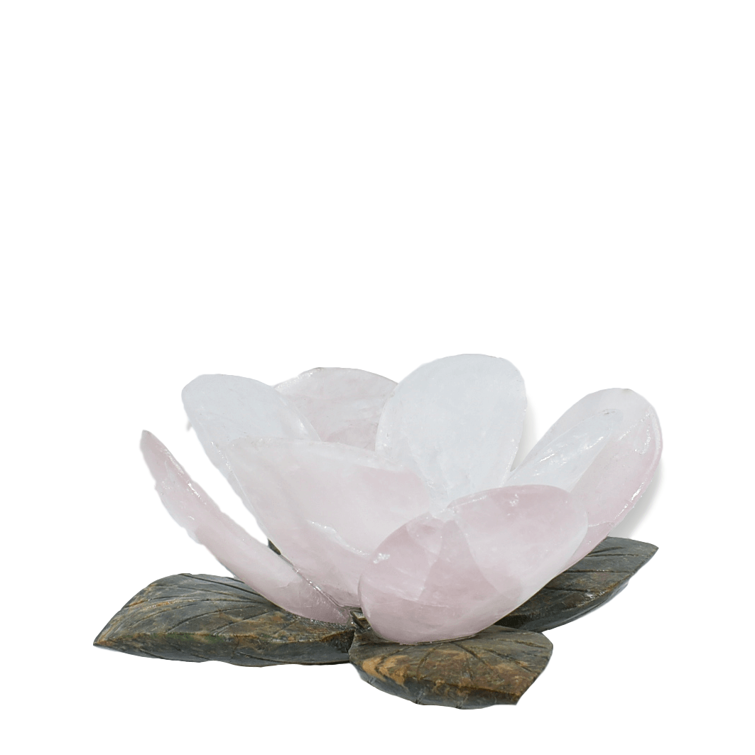 A beautifully carved Flower Quartz Candleholder featuring a delicate flower design atop a polished stone base, available in white and rose quartz.