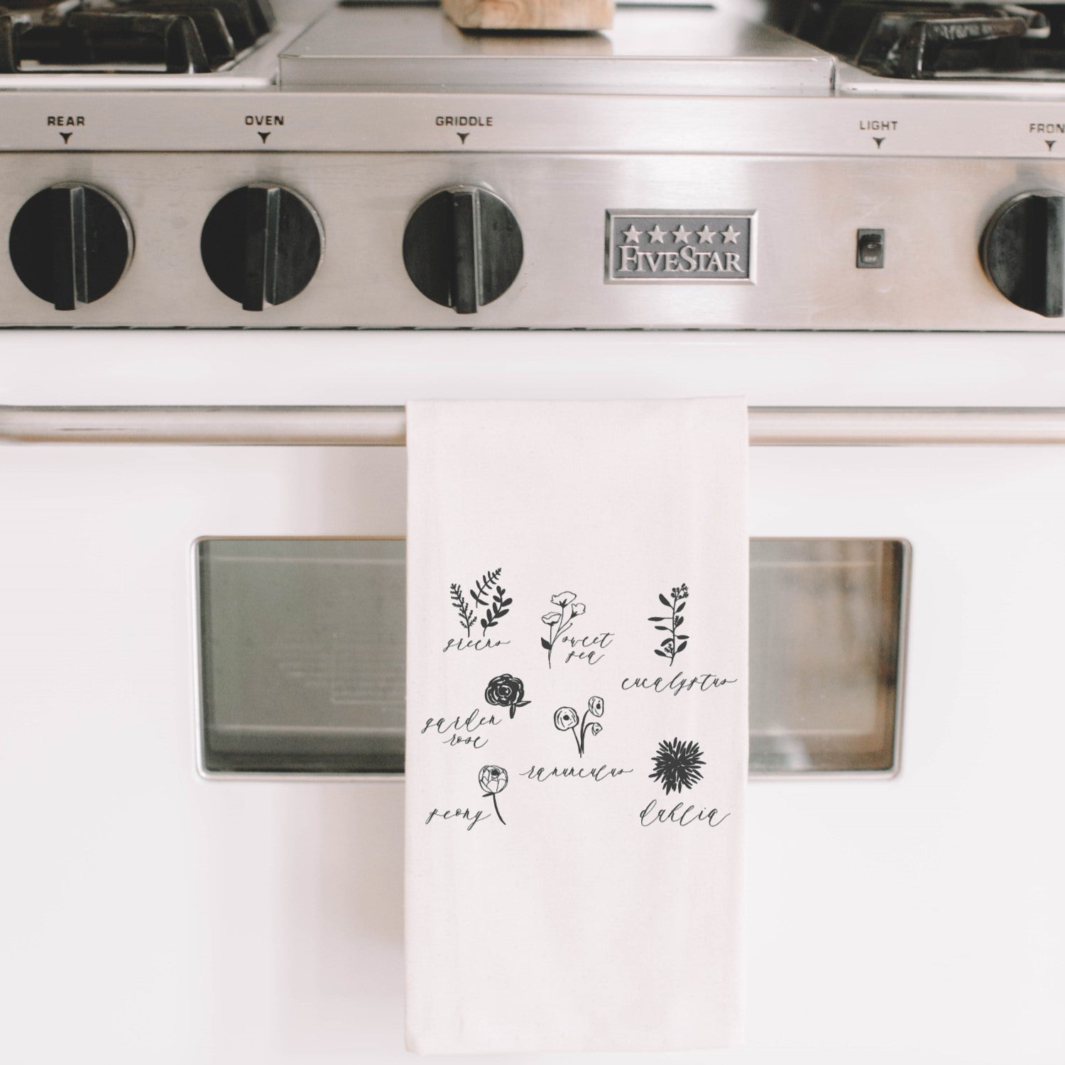 Flower Types Tea Towel featuring unique calligraphy design by Alyssa Thiel, made from 100% organic cotton in white and natural colors.