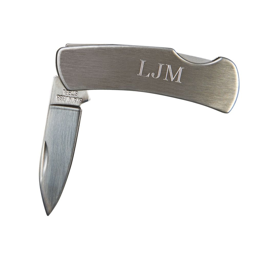 A stainless steel folding locking pocket knife with a smooth finish, showcasing its blade and locking mechanism, ideal for engraving.