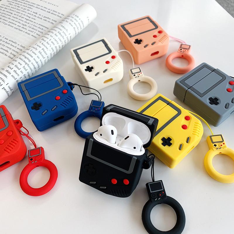 Cute Gameboy design protective case for AirPods, showcasing vibrant colors and a finger ring strap for easy carrying.