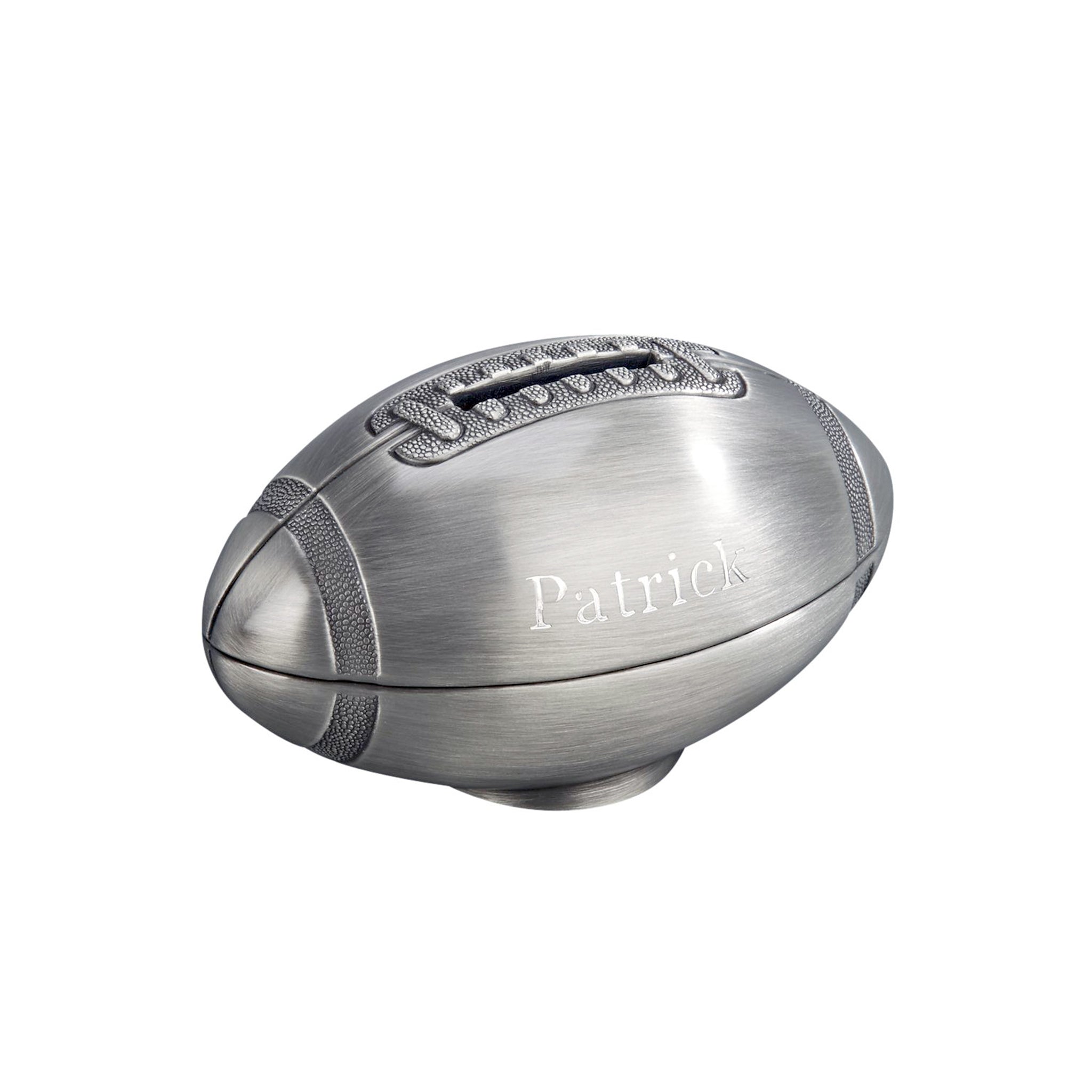 A stylish football-shaped bank made of brushed pewter, featuring a coin slot in the middle of the laces, perfect for saving coins.