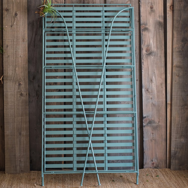 Four Tire Foldable Metal Shelf in green and blue, showcasing its stylish design and four-tier structure.