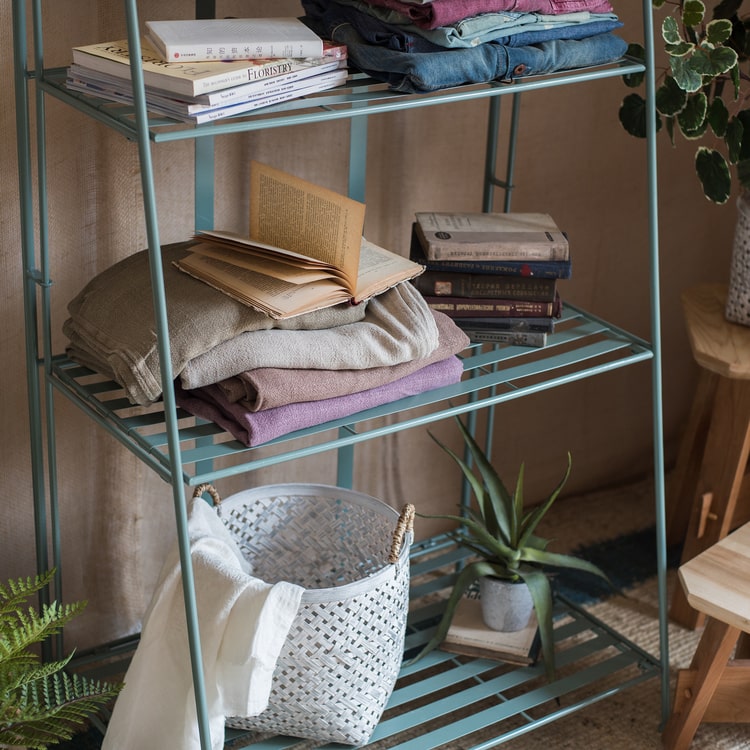 Four Tire Foldable Metal Shelf in green and blue, showcasing its stylish design and four-tier structure.