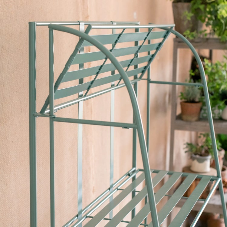 Four Tire Foldable Metal Shelf in green and blue, showcasing its stylish design and four-tier structure.