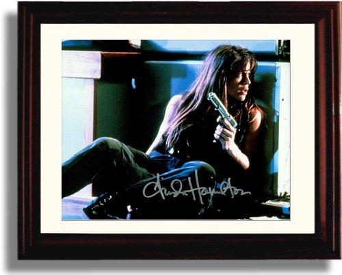 Framed 8x10 glossy print of Linda Hamilton with a printed signature, perfect for fans and collectors.