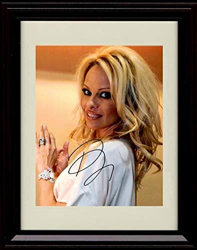 Framed 8x10 glossy print of Pamela Anderson with a printed autograph, perfect for fans.