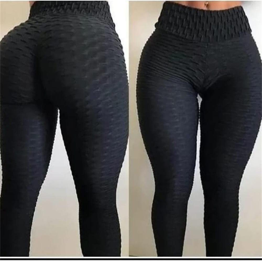 A pair of high waist slim fitness leggings for women in a stylish plaid pattern, showcasing their casual and fashionable design.