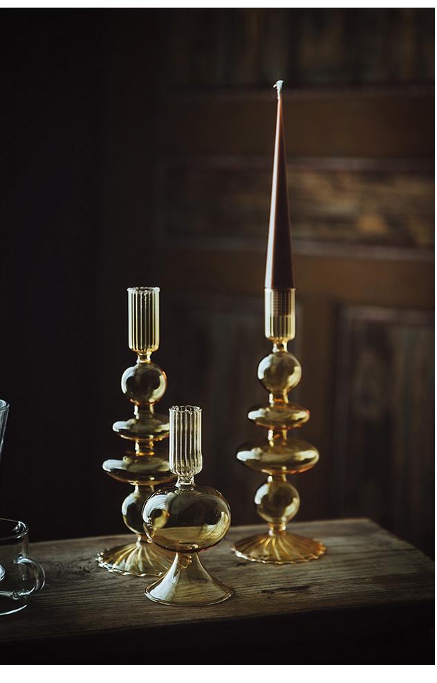 Elegant glass French candle holder set designed for drip-less candles, enhancing interior decor.