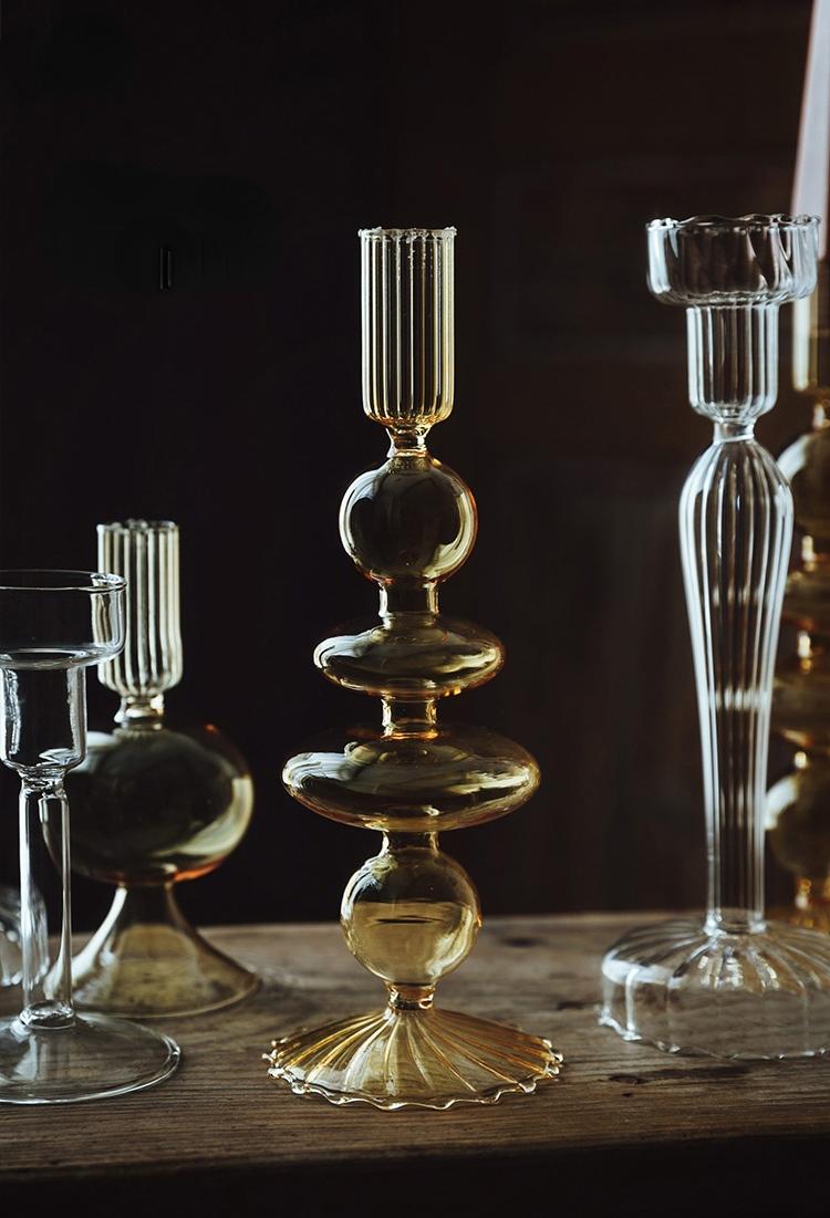 Elegant glass French candle holder set designed for drip-less candles, enhancing interior decor.