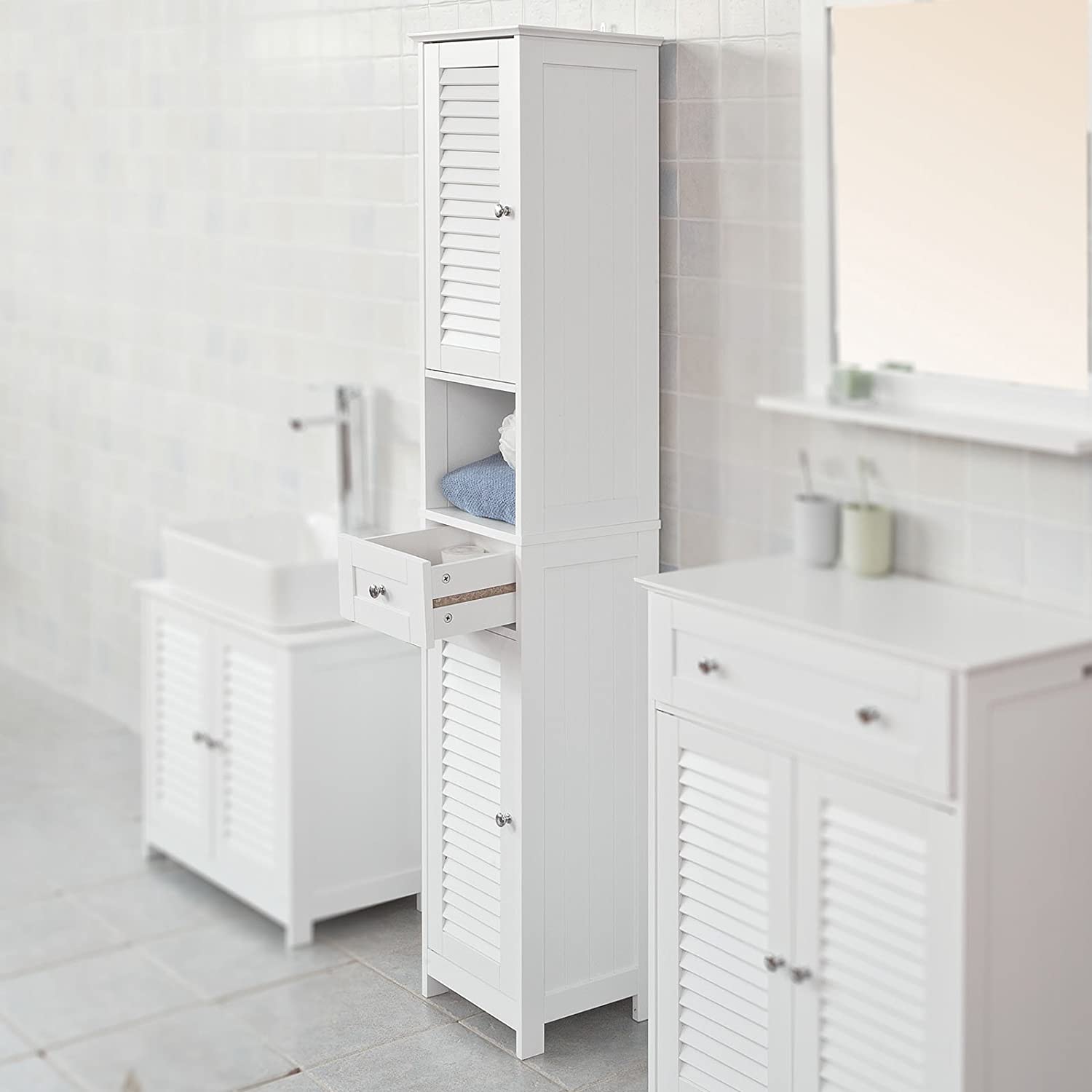 Freestanding Tall Bathroom Cabinet in white with two shutter doors and a drawer, showcasing adjustable shelves inside.