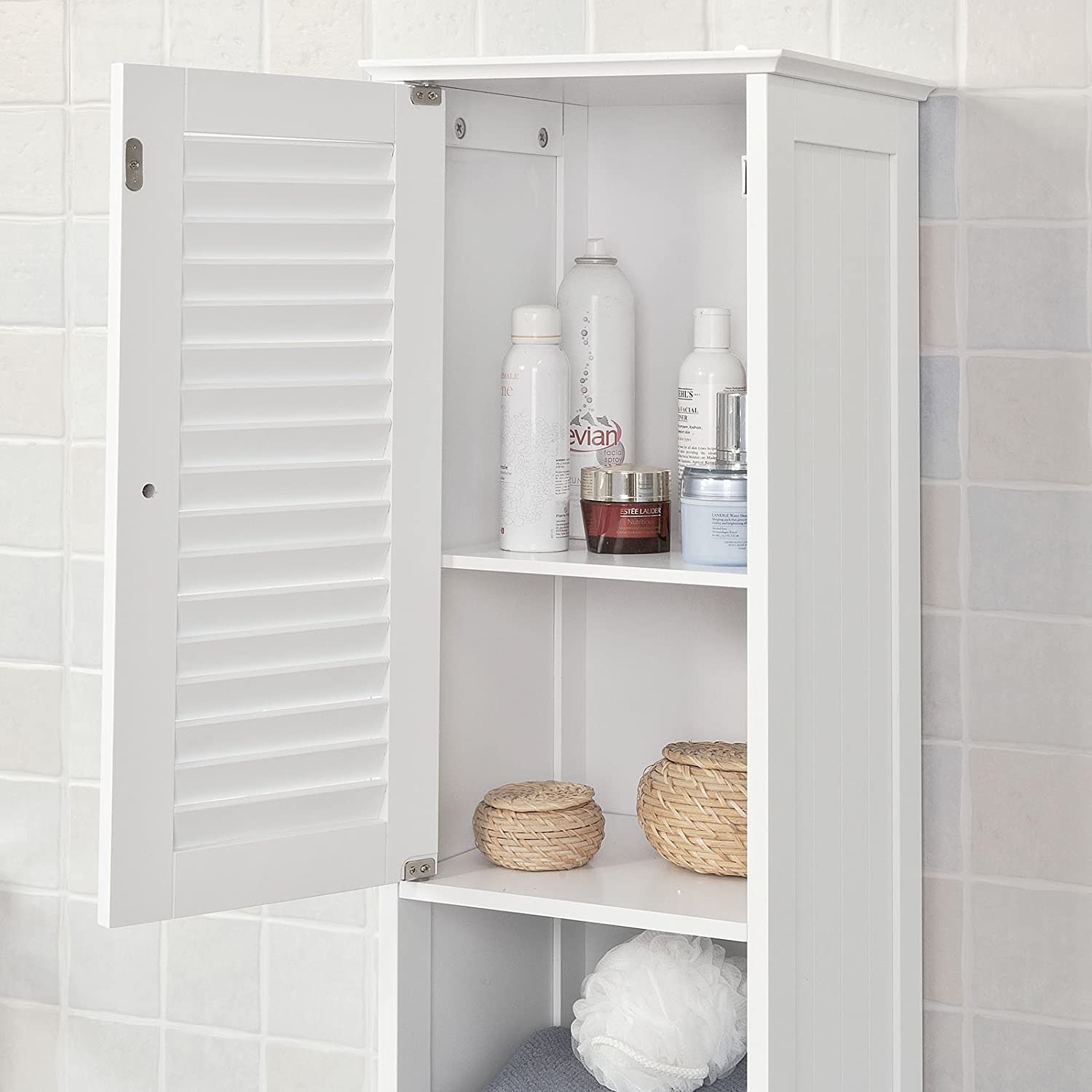 Freestanding Tall Bathroom Cabinet in white with two shutter doors and a drawer, showcasing adjustable shelves inside.