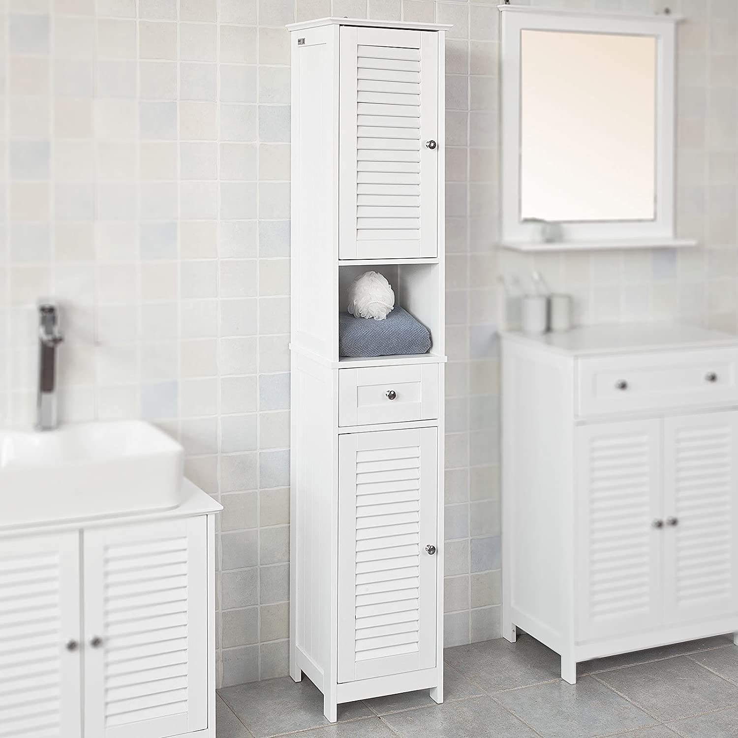 Freestanding Tall Bathroom Cabinet in white with two shutter doors and a drawer, showcasing adjustable shelves inside.