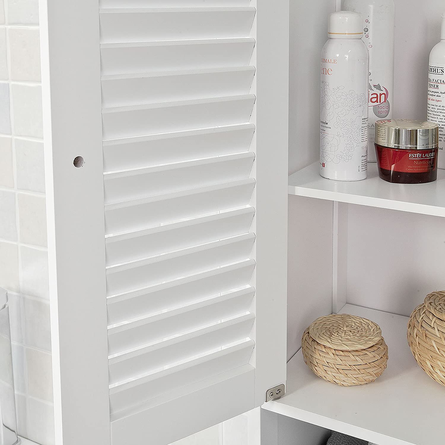 Freestanding Tall Bathroom Cabinet in white with two shutter doors and a drawer, showcasing adjustable shelves inside.