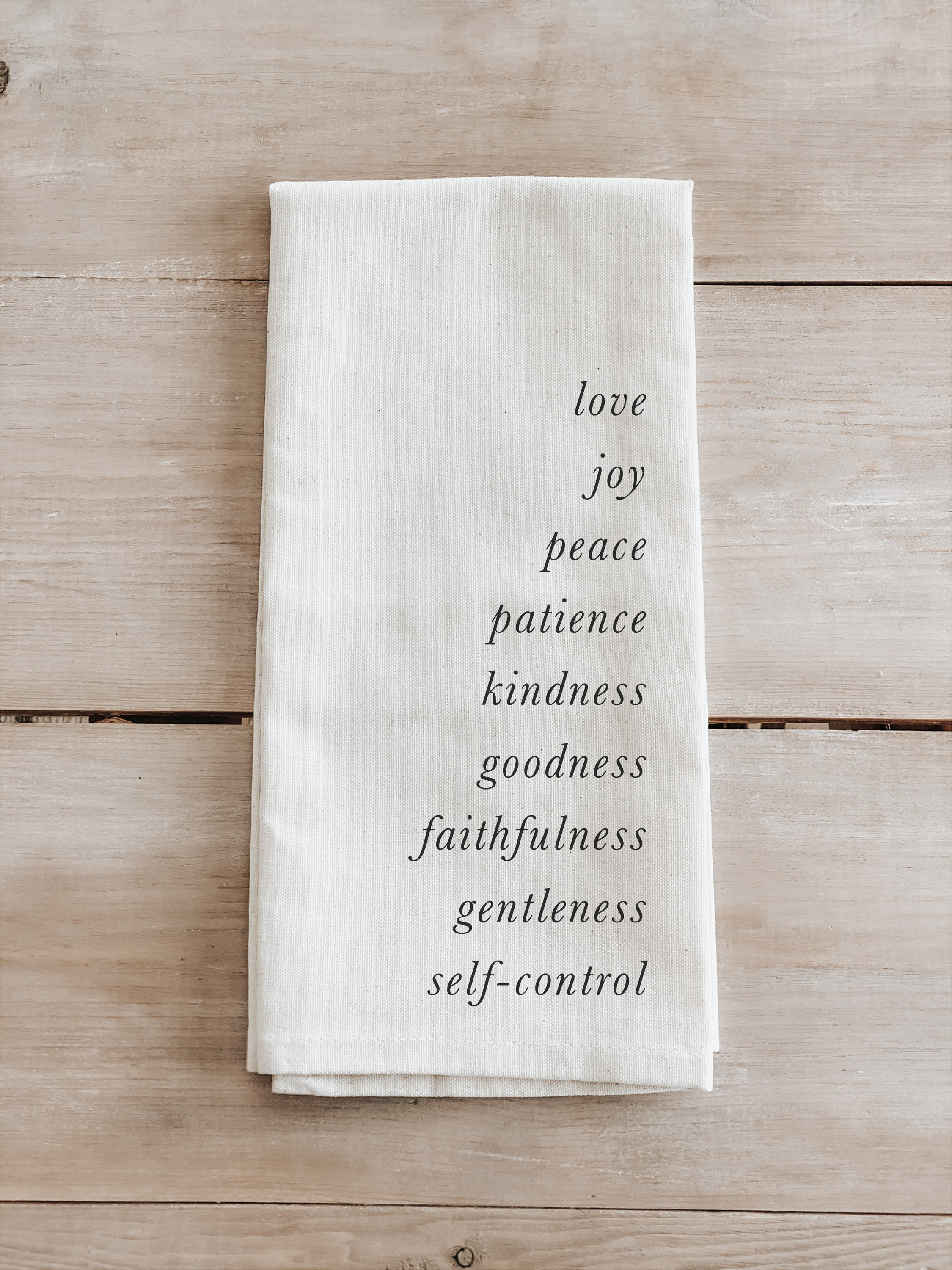 Fruit of the Spirit Kitchen Towel in white and natural colors, made of organic cotton with inspirational design.