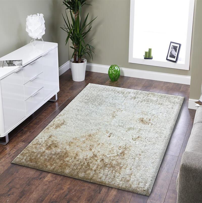 Fuzzy Beige Area Rug showcasing a soft shaggy texture, perfect for home decor.