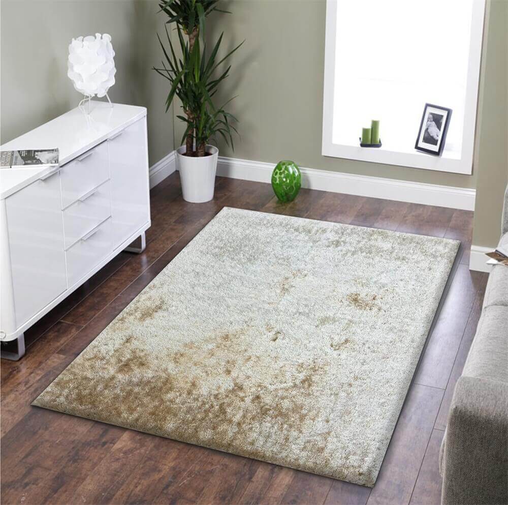 Fuzzy Beige Area Rug showcasing a soft shaggy texture, perfect for home decor.