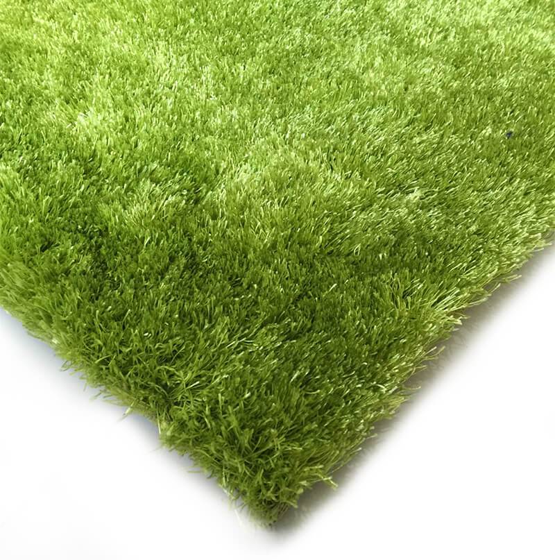 Fuzzy Lime Area Rug showcasing a soft shaggy texture in vibrant lime color, perfect for enhancing home decor.