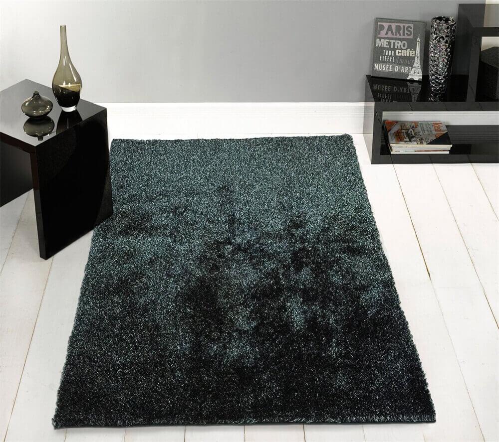 Fuzzy Two Tone Black Ash Area Rug showcasing a soft shaggy texture in black and rust colors, perfect for enhancing home decor.