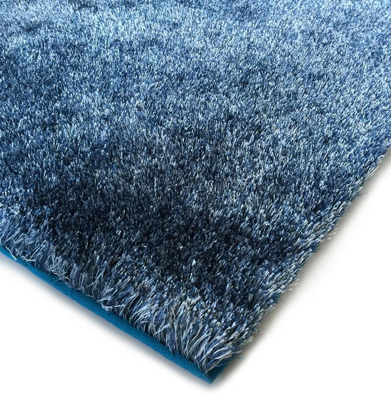 Fuzzy Two Tone Blue Area Rug showcasing a soft shaggy texture and vibrant blue color, perfect for home decor.