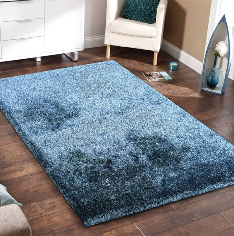 Fuzzy Two Tone Blue Area Rug showcasing a soft shaggy texture and vibrant blue color, perfect for home decor.