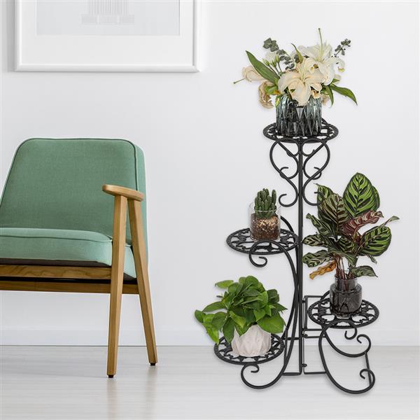 A stylish black metal garden flower stand with four rounded shelves, displaying various potted plants in an outdoor setting.