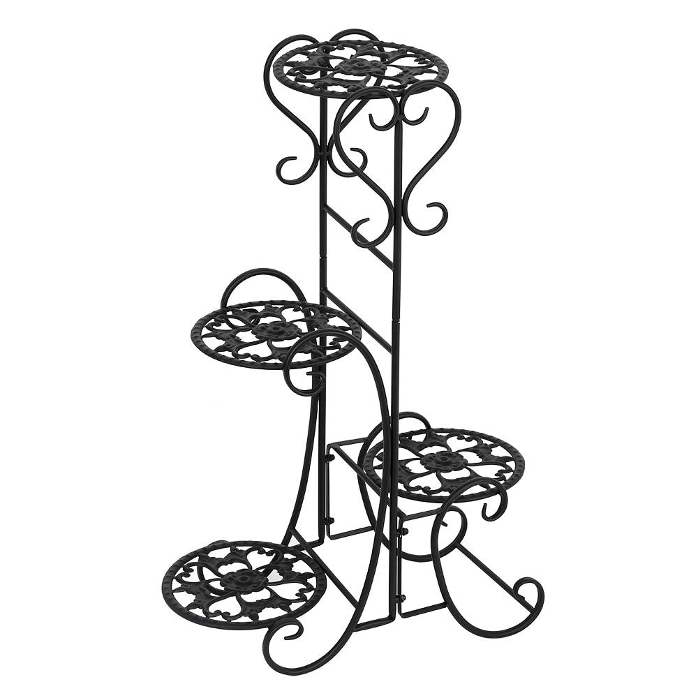 A stylish black metal garden flower stand with four rounded shelves, displaying various potted plants in an outdoor setting.