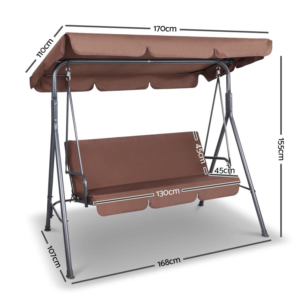 Gardeon 3 Seater Outdoor Canopy Swing Chair in Coffee color, featuring a sturdy steel frame and plush cushions, set in a garden environment.