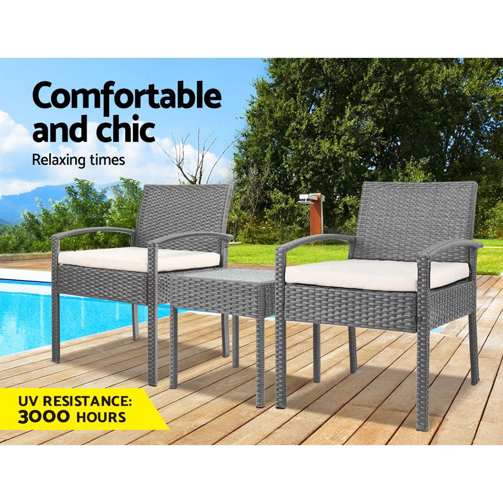 Gardeon 3-piece outdoor set in grey featuring two chairs and a side table with a glass top, showcasing elegant design and comfortable cushions.