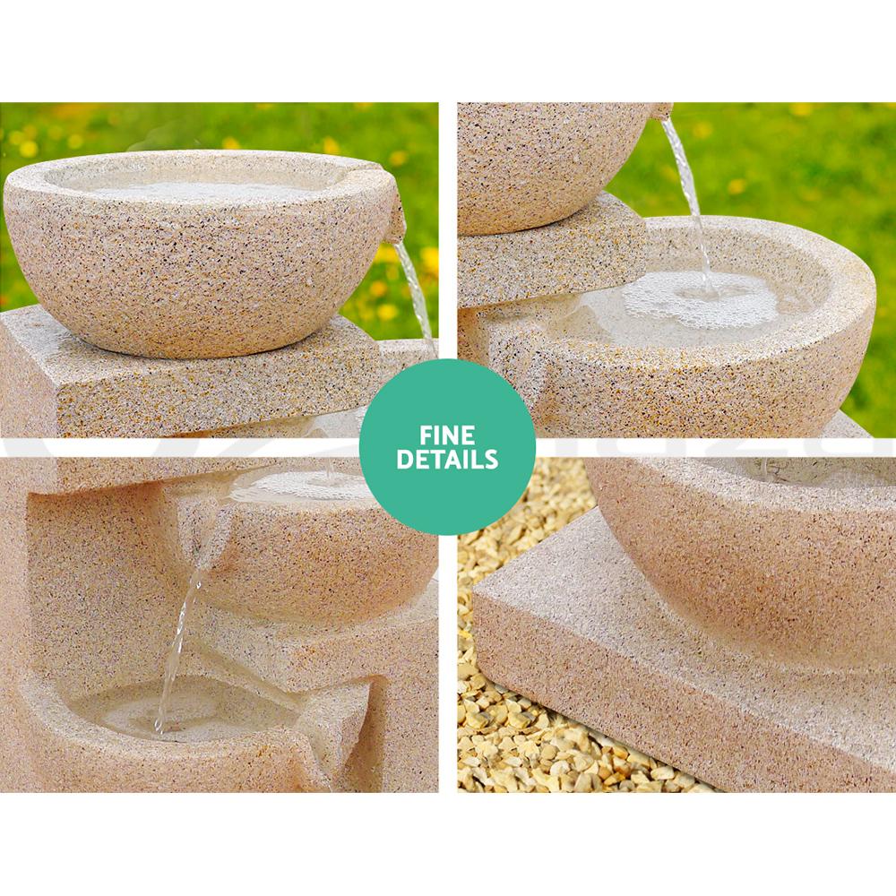 Gardeon 4 Tier Solar Powered Water Fountain in sand beige, featuring cascading tiers and LED lights, perfect for outdoor and indoor decor.