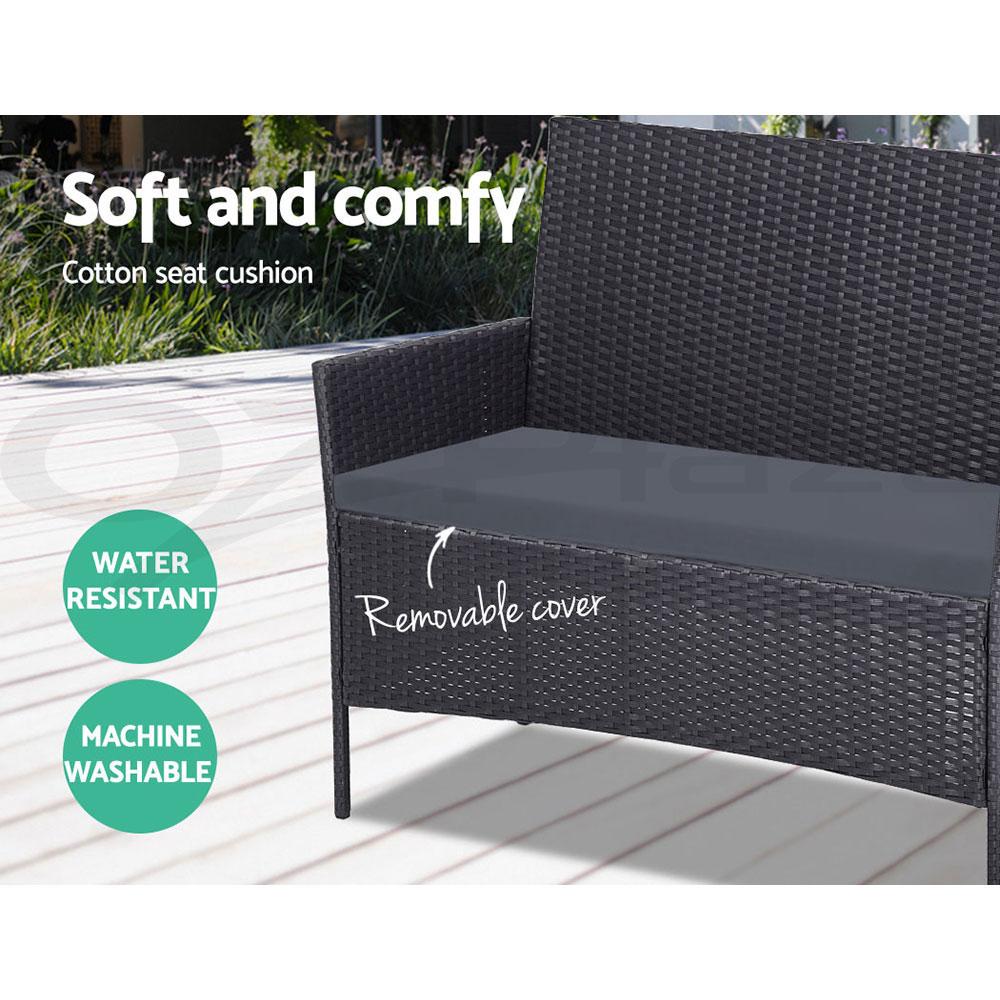 Gardeon 4-piece outdoor lounge setting featuring a chic loveseat, two armchairs, and a matching side table with a glass top, set in a stylish outdoor environment.