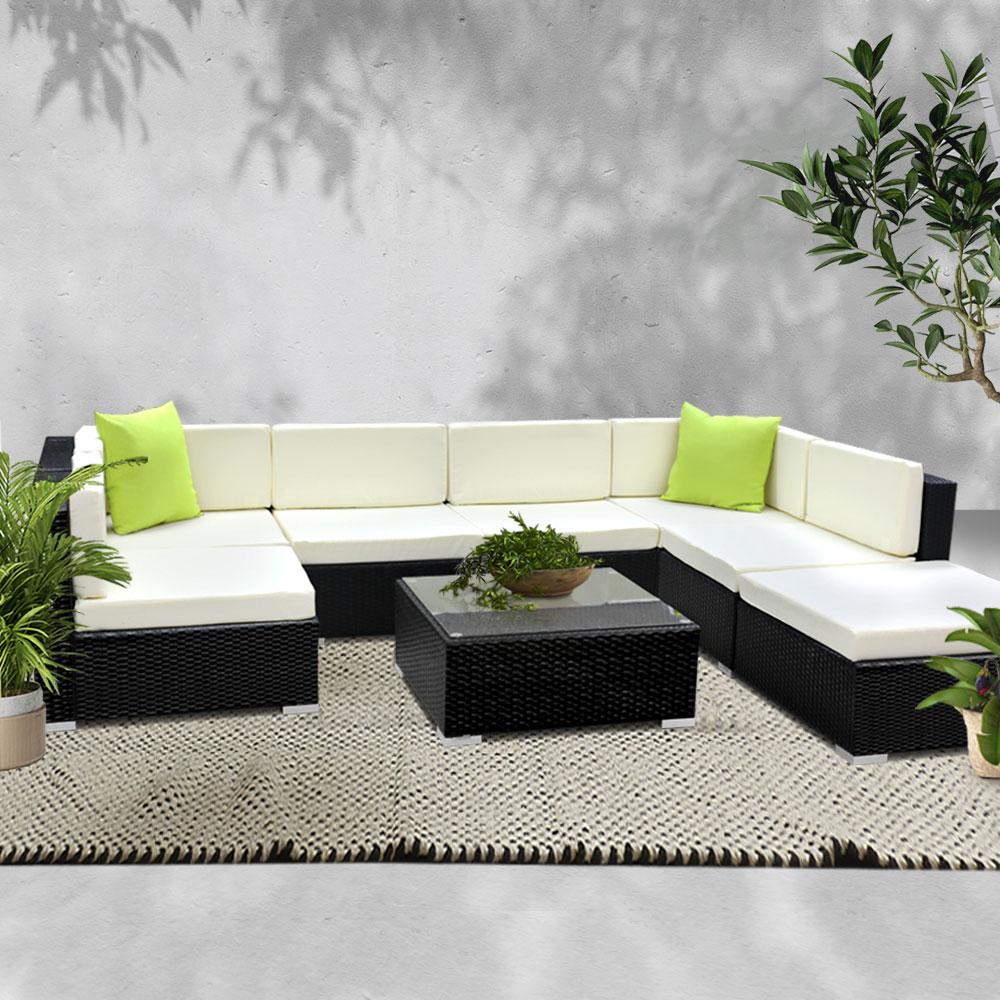 Gardeon 8PC Outdoor Furniture Sofa Set featuring black aluminum frame, beige cushions, and lime green throw pillows, perfect for patio or garden.