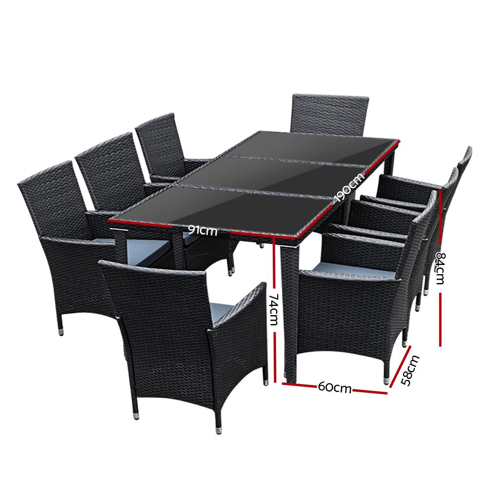 Gardeon 9 Piece Outdoor Dining Set in Black featuring eight chairs and a spacious table with a tempered glass top, set in an outdoor environment.