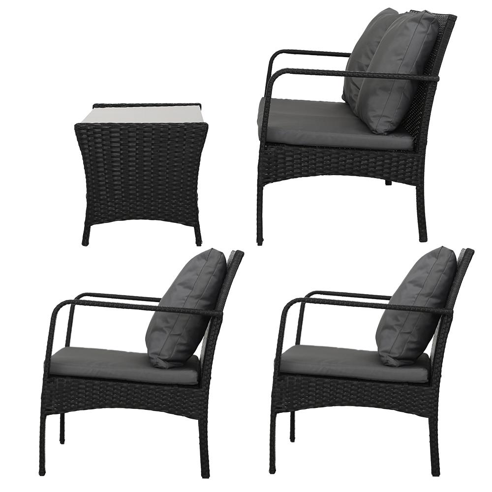 Gardeon Outdoor Furniture Lounge Set featuring two armchairs, a loveseat, and a table with cushions in a stylish garden setting.