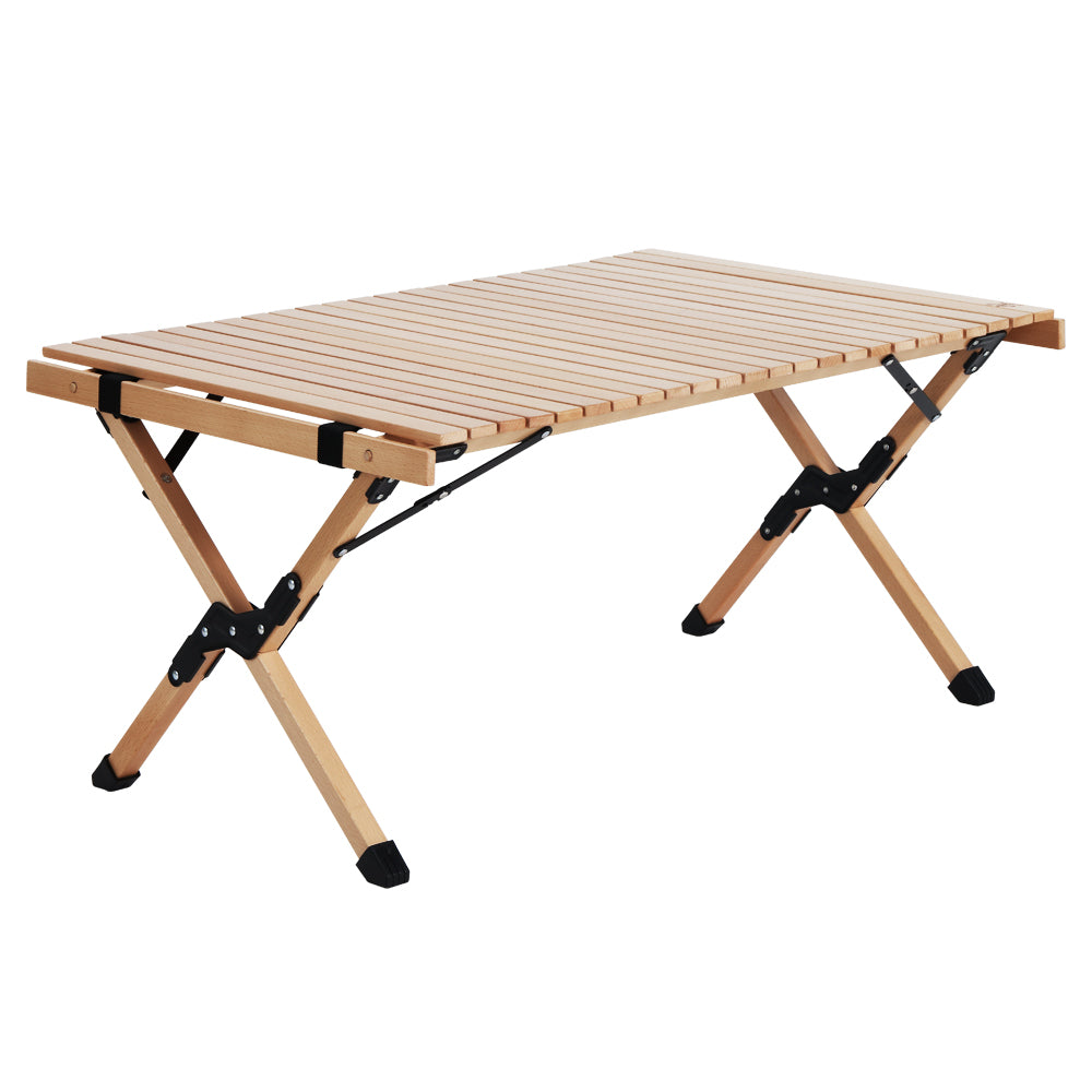 Gardeon Outdoor Furniture Wooden Egg Roll Picnic Table set up in a natural outdoor setting, showcasing its beech wood finish and lightweight design.